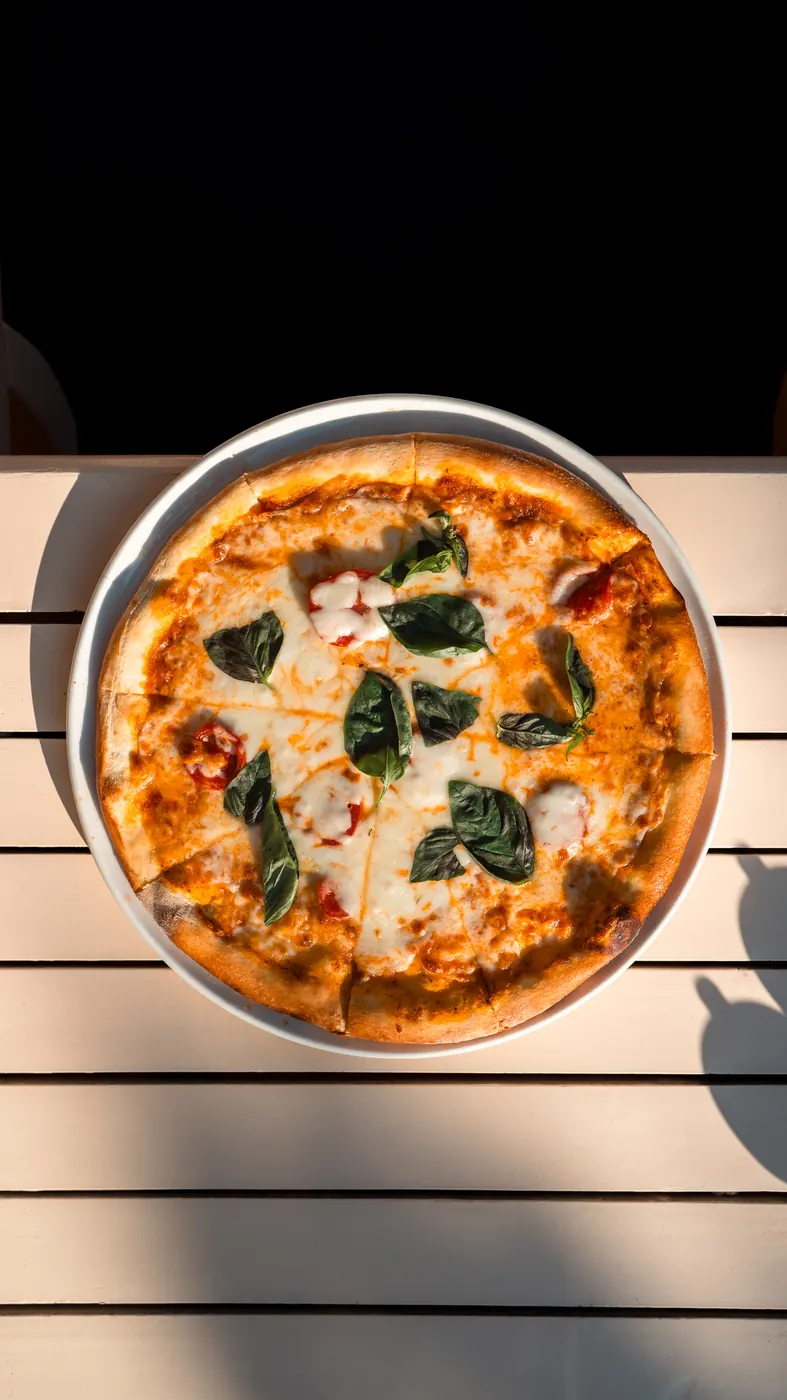 Pizza with fresh basil